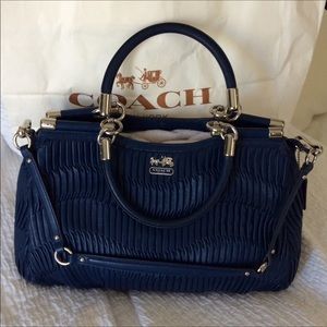 Coach gathered like new